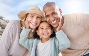 Family smiling for portrait